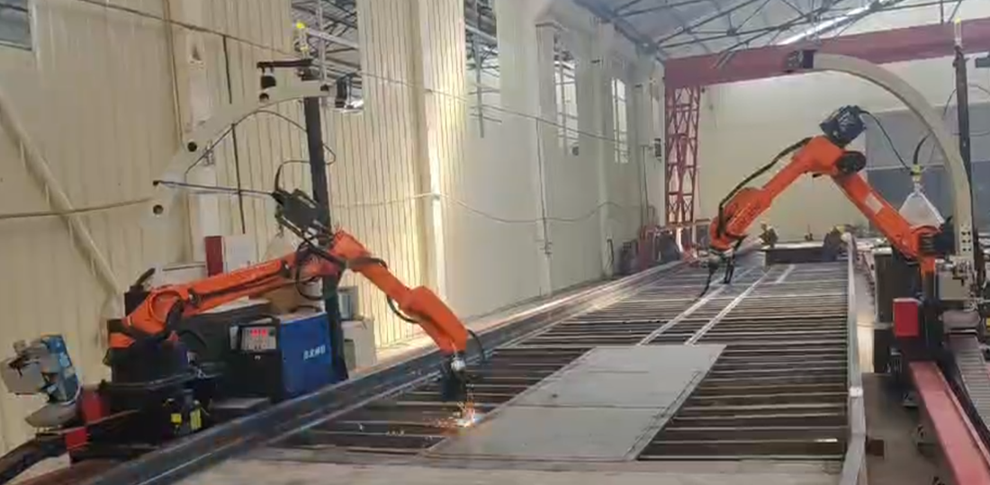 Dual XARP XP2010-10W robotic welding workstation for large stainless steel box bases